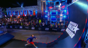 An American Ninja Warrior contestant attempts The Warped Wall. (Photo credit: www.austin360.com.)